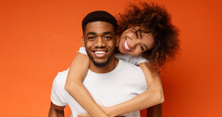 A young couple smiling